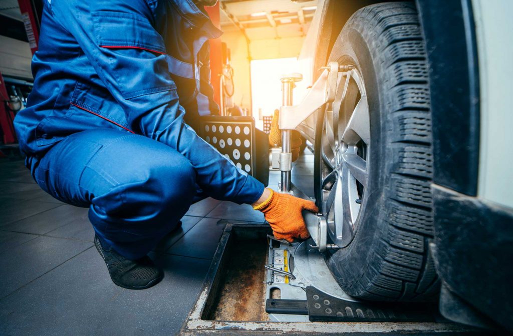 technician changing over tires